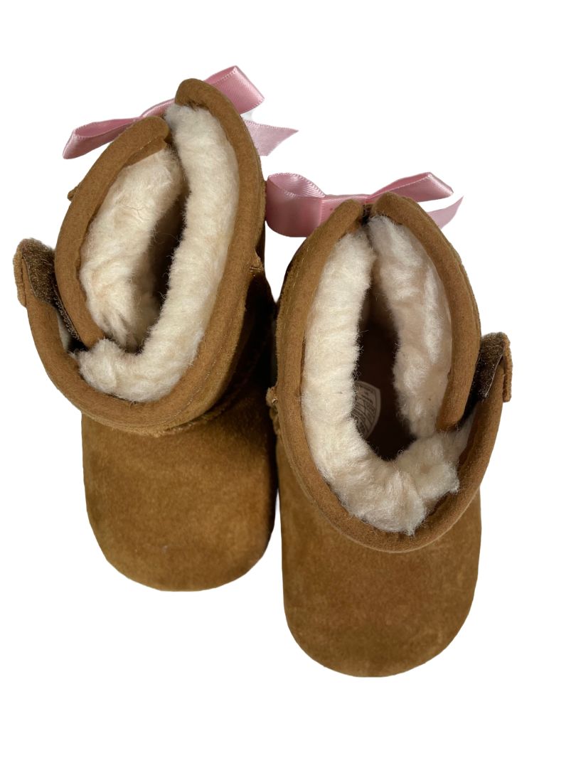Size 4-5, UGG, Brown, Suede boots, wool blend lining, 2 hook-and-loop closures, pink bows on back
