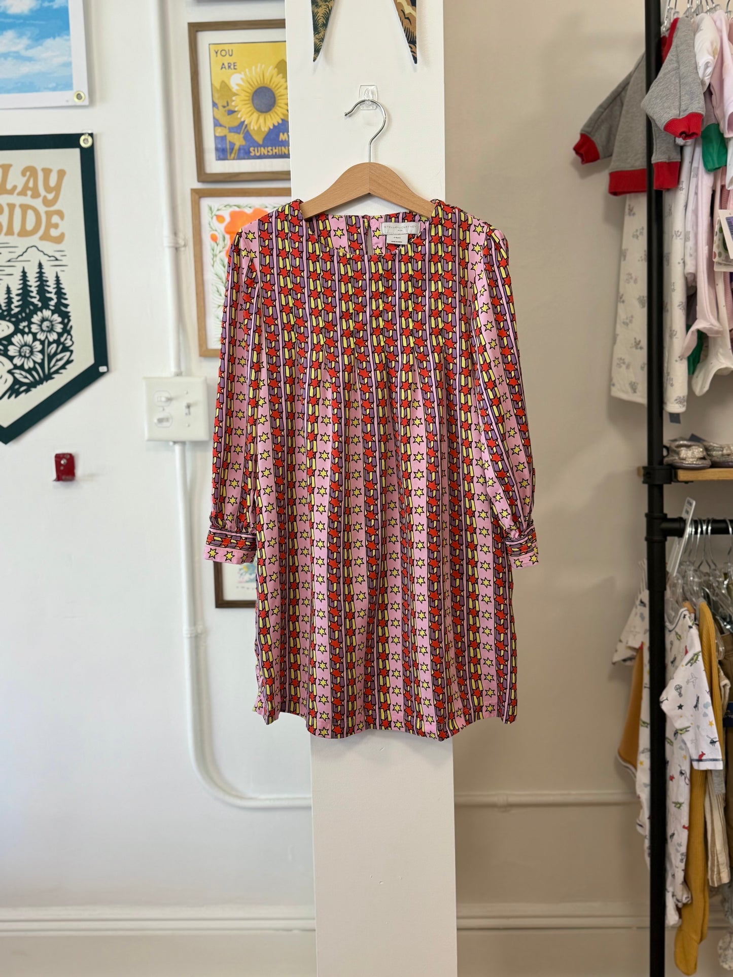 6, Stella McCartney, Pink, Yellow/red/purple pleated stripes & star long-sleeve dress