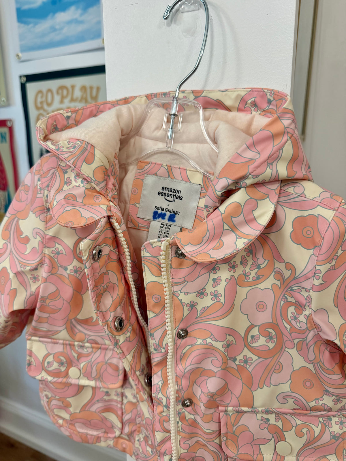 12 mo, Amazon Essentials x Sofia Grainge, Cream, Pink groovy floral hooded water-repellant rain jacket